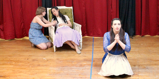 Hidaspes (Amelia Fei) dies from a broken heart while her maids (Ivy Tinker and Lindsay Fabes) tend and pray for her in Bad Quarto's 2017 production of <em>Cupid's Revenge</em>, directed by Angelina LaBarre. Photo by James M. Smith.
